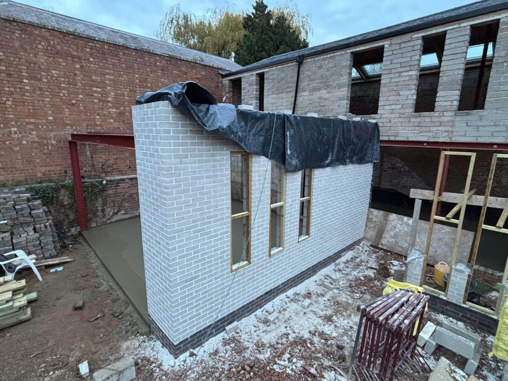 White brick extension under construction at a residential property in Leamington Spa.