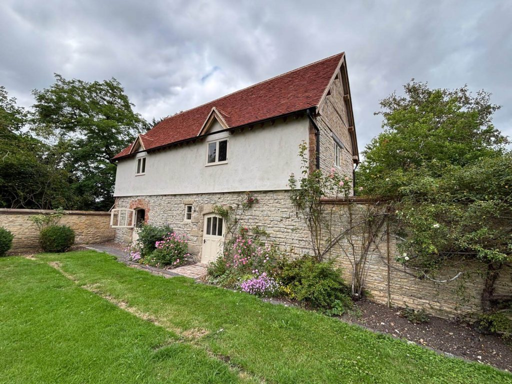 Exterior of a 15th-century brewhouse in Leamington Spa before restoration.